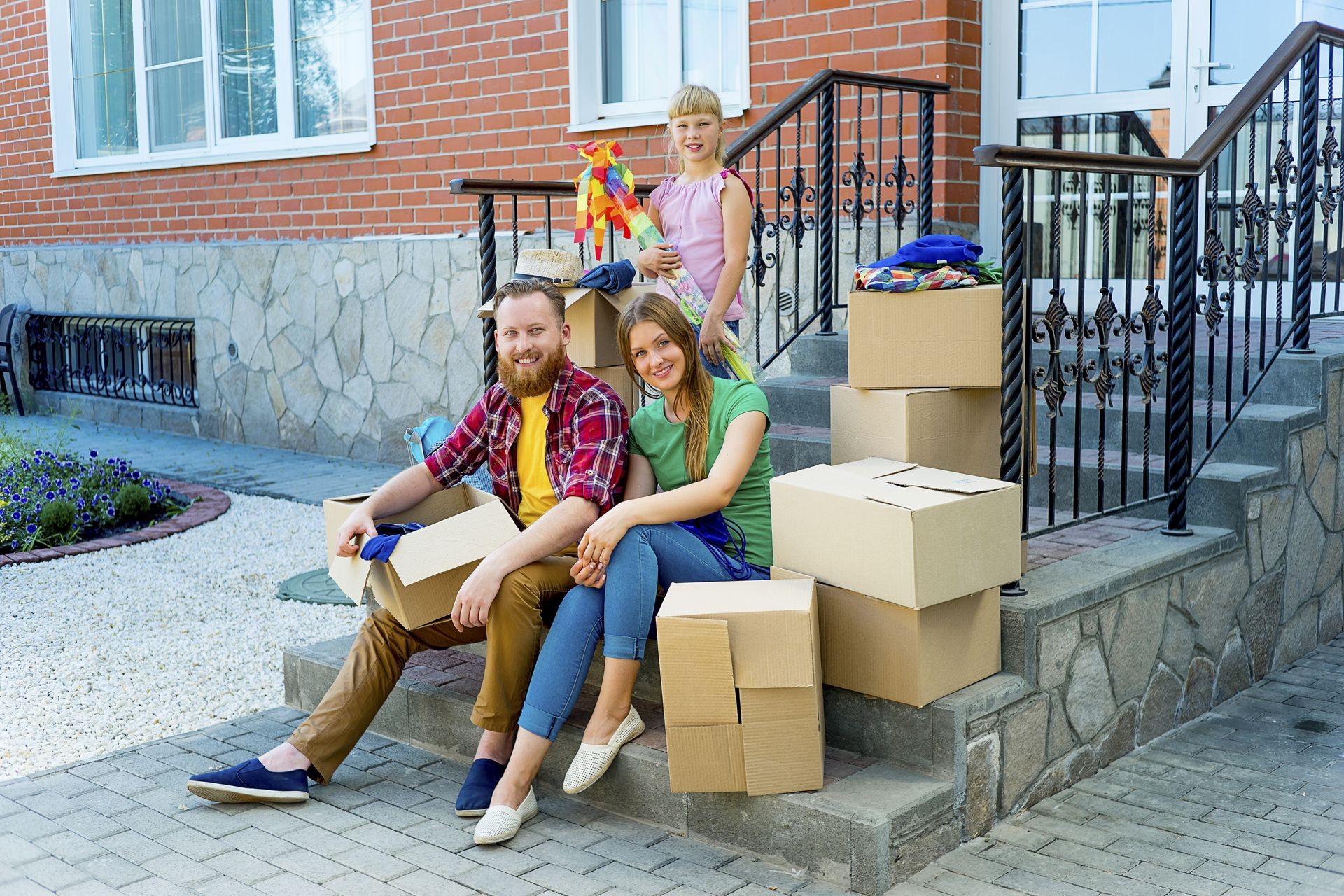 Happy family is moving into a new house